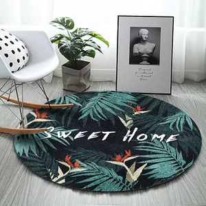Tapis rond moderne avec motif de feuilles de palmier tropicales et texte Sweet Home