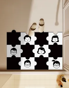 A black and white cartoon puzzle bath mat displayed in a modern bathroom setting