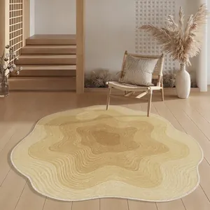 Scalloped cream area rug with wave patterns in a minimalist Japandi living space