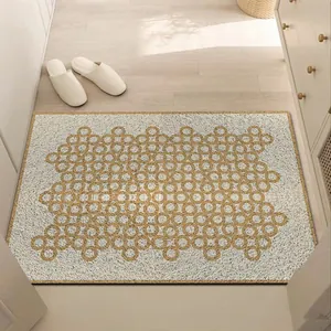Modern silk loop entryway door mat with geometric circle pattern in a bright hallway.