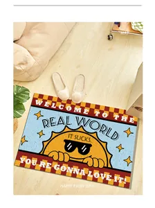 Detail view of an American style anti-slip silk loop door mat with a sun graphic design
