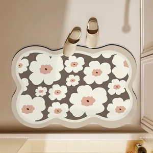 Absorbent floral bathroom floor mat with wavy edges and quick-dry diatomite material