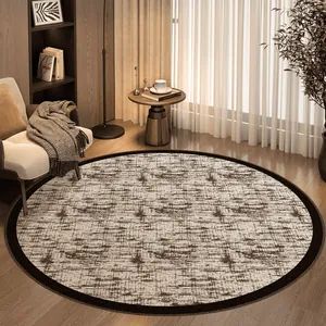 Modern textured round loop pile area rug in a minimalist cream-style living room