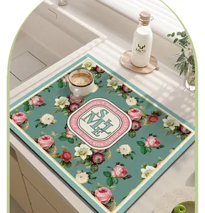 Vintage floral kitchen drying mat featuring rose patterns and absorbent PVC material
