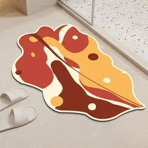Alfombrilla de baño absorbente antideslizante con diseño de hoja abstracta tonos cálidos