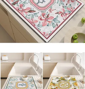 Detailed view of floral PVC leather dish drying mat for kitchen sink and coffee bar