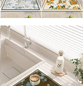 Floral PVC leather kitchen draining mat in a modern sink setting with natural light