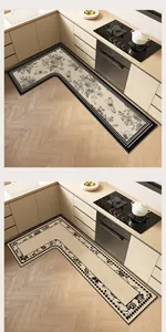 Comparison of two L-shaped linen kitchen mats with floral and butterfly patterns.