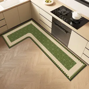L-shaped linen woven kitchen mat with green pattern in a modern kitchen setting
