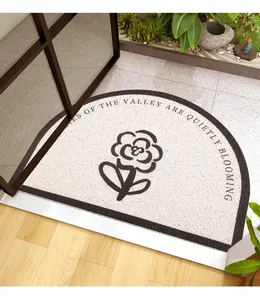 Semi-circular silk ring doormat with lily of the valley floral pattern detail