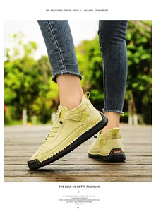 Close-up detail of yellow hand-stitched leather loafers with soft gum sole for women