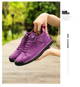 Premium purple hand-stitched leather loafers featuring soft rubber sole for women