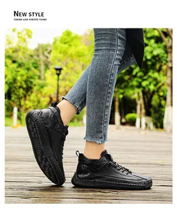 Detailed view of handmade black leather flat shoes with durable soft rubber sole