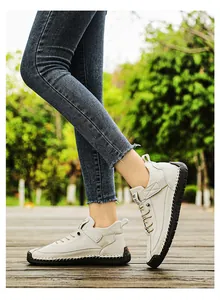 Detail of handmade stitched women casual shoes with soft rubber soles outdoors
