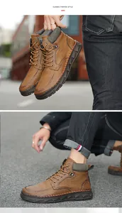Detailed view of brown men's Martin boots in a stylish urban outdoor setting