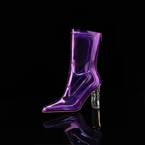 A detailed side view of a purple transparent PVC ankle boot with a clear chunky heel.