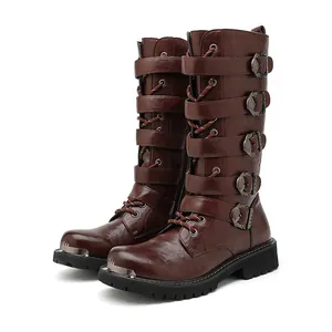 Vintage brown leather punk motorcycle boots with multiple buckles and metal toe cap.