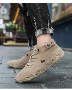 Vue latérale des bottes beiges pour hommes avec semelle pieuvre et logo LDECK