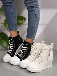 Stylish high-top canvas wedge sneakers for women featuring a side zipper closure