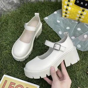 Stylish white platform Mary Jane shoes with round toe and silver buckle strap