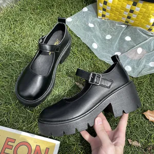 Detailed side profile of black platform Mary Jane shoe featuring thick sole and buckle