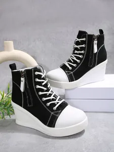 Fashionable black and white high-top wedge canvas sneakers with side zipper closure