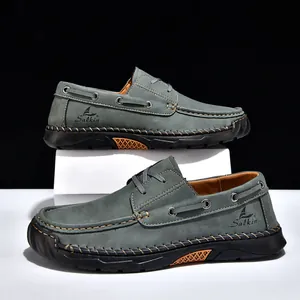 Detailed side view of hand-stitched men casual loafers with slip-resistant rubber soles