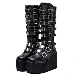 Punk style black leather knee-high boots with multiple metal buckles and 11cm platform