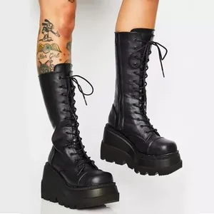 Black gothic platform wedge knee-high lace-up boots for women with heavy lug sole