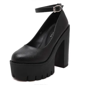 Detailed view of fashionable black 14cm platform high heel pumps with an ankle strap.