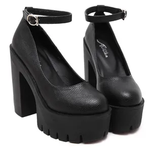Detailed view of black 14cm chunky heel platform shoes with ankle straps and lychee pattern leather