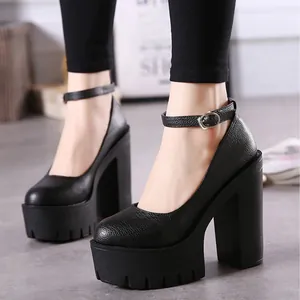 Detailed view of women's black 14cm platform high heels with ankle strap and chunky block heel