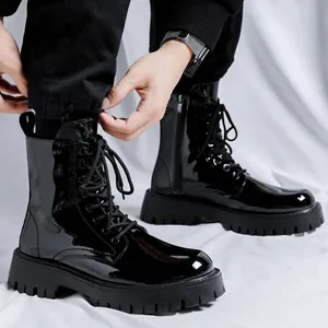 Stylish black patent leather combat boots for men featuring a high-top lace-up design