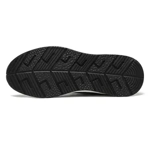 Detailed view of the black non-slip rubber outsole for height increasing sneakers