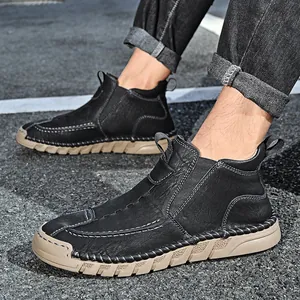 Outdoor men's black leather Martin boots featuring thick anti-slip rubber soles for winter.