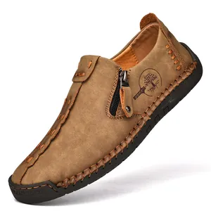 Mocasines informales de cuero marrón para hombre con cremallera lateral y costuras a mano