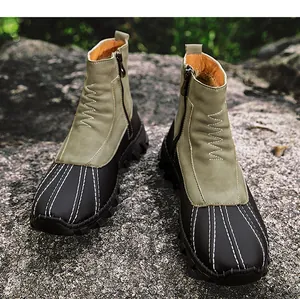 Detail robuster olivgrüner und schwarzer Herren-Winterstiefel mit warmem Plüschfutter