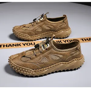Dettaglio laterale di scarpe da trail mesh marroni traspiranti da uomo con suola