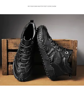 Detailed side view of black high-top leather outdoor casual shoes with textured finish