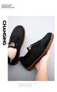 Detail of breathable black mesh men's shoes with durable gum rubber sole