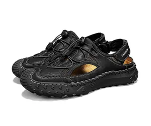 Detail view of men's black leather sandals with mesh panels and adjustable heel straps