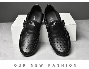 Detail view of breathable black men's hollow-out loafers with soft soles for driving