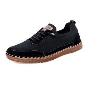 Breathable black mesh men's casual shoe with durable gum sole and hand-stitched details