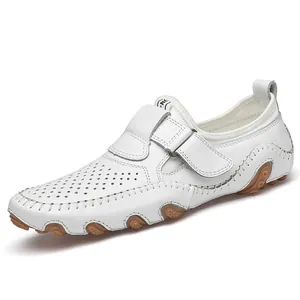 Breathable white perforated men's loafers with slip-on design and soft rubber soles