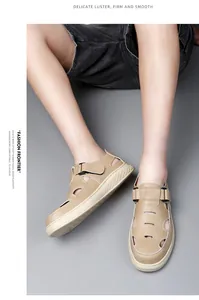 Detail view of men's breathable hollow-out beige sandals on model for summer beach