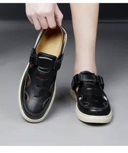 Breathable men's hollow-out leather sandals with anti-slip sole for summer comfort.