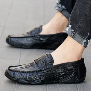 Men's premium black leather loafers with embossed crocodile pattern for business casual wear.