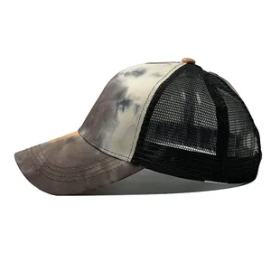 Side view of tie-dye camouflage mesh trucker hat with breathable black mesh back