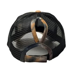 Detailed back view of tie-dye mesh baseball cap showing the ponytail hole design
