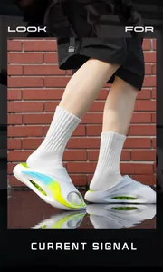 Low angle macro view of men's white sports slippers on a reflective wet surface